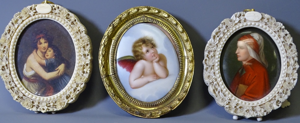 PAIR OF OVAL, 19TH CENTURY IVORY FRAMES and a brass example, one containing a painted porcelain
