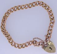 NINE CARAT GOLD CURB LINK BRACELET with padlock clasp, fully stamped, 8.5grms