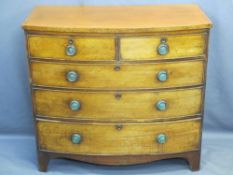 MID-19TH CENTURY BOW FRONT MAHOGANY CHEST of two short over three long drawers having classical