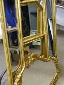 MODERN GILT FRAMED WALL MIRRORS (5) including a slim pair in the antique style, ribbon crested