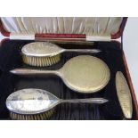CASED FIVE PIECE ELECTROPLATED BRUSH (3), COMB(1) & HAND MIRROR(1) SET
