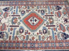 THREE EASTERN STYLE WOOLLEN CARPETS, various colours and sizes with traditional patterning, the