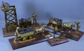 BRASS MODELS DEPICTING MINING SCENES all on wooden plinths (4)