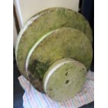 THREE CIRCULAR STONE MILLLER'S GRINDING WHEELS, 40cms, 62.5cms and 74cms, diameters respectively