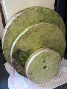 THREE CIRCULAR STONE MILLLER'S GRINDING WHEELS, 40cms, 62.5cms and 74cms, diameters respectively