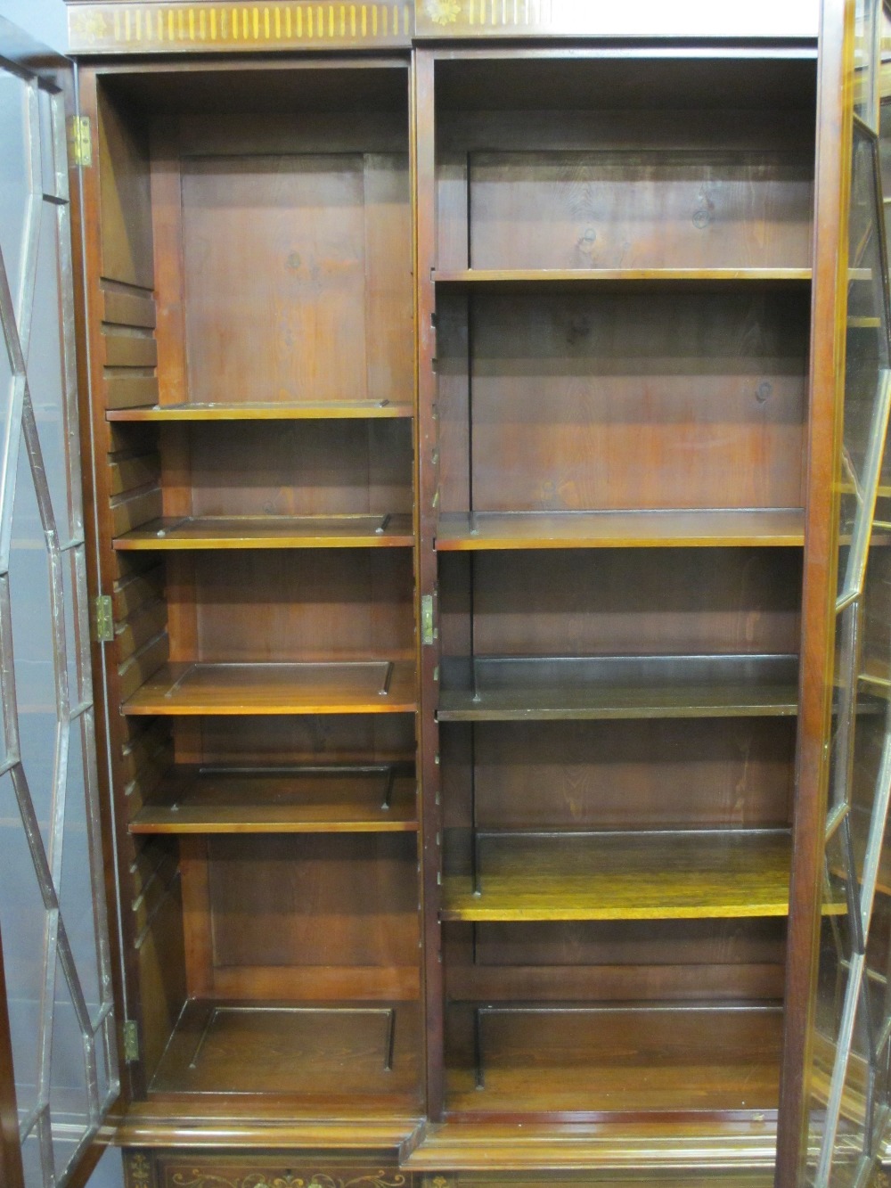 EDWARDIAN SHERATON STYLE INLAID BREAKFRONT BOOKCASE/CABINET having three lower drawers on square - Image 2 of 5