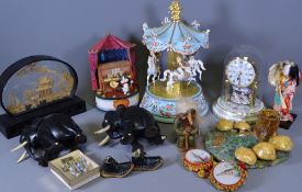 JUDITH WINSLOW 'CAROUSEL OF LOVE' MUSICAL ORNAMENT, 29cms H, ebony elephants and other cabinet and