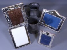 THREE SILVER PHOTO FRAMES, one EPNS example and two one pint pewter tankards