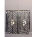 WROUGHT IRON GARDEN PANELS, a pair, 66cms H, 142cms L