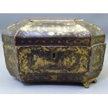 LACQUERED TEA CADDY with gilt oriental decoration, interior pewter containers with lids (