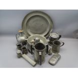 PEWTER - a large parcel including large charger, four circular plates, triple handled tankard and