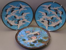CLOISONNE - three chargers including a pair, blue ground with flying cranes, 30cms diameter and a