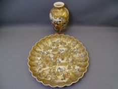 SATSUMA - a formerly fine circular Satsuma charger with gilt butterfly rim and '100' figures,