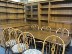 EXTENSIVE ERCOL DINING ROOM SUITE - Medium Oak, comprising refectory style table, 72cms H, 183cms L,