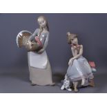 LLADRO BOXED FIGURE - A girl on a phone and another Lladro figure