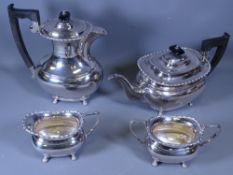 SILVER TEA & COFFEE SERVICE - four pieces all of oblong plain form with beaded style decoration