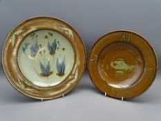 TWO DAVID FRITH ART POTTERY CIRCULAR CHARGER TYPE DISHES, 28cms and 33cms diameter respectively,
