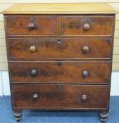 VICTORIAN MAHOGANY CHEST of two short over three long drawers with turned wooden knobs on bun