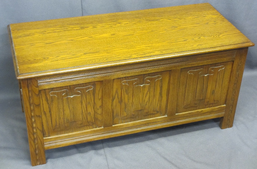 JAYCEE REPRODUCTION OAK LIDDED BLANKET CHEST with linenfold front detail, 51cms H, 105.5cms W, 46.