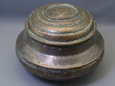 A LARGE PERSIAN COPPER CIRCULAR STEPPED CONTAINER WITH LID, 30cms diameter, 22cms H