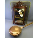 ANTIQUE COPPER WARMING PAN with patterned lid and turned handle, a brass framed glass firescreen and