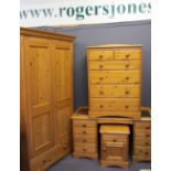MODERN PINE FOUR PIECE BEDROOM SUITE, retailed by Marks & Spencers, consisting of a two-door