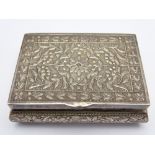 CONTINENTAL WHITE METAL RECTANGULAR SNUFF BOX, the lid, side and front panels having floral