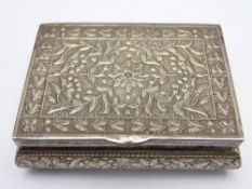 CONTINENTAL WHITE METAL RECTANGULAR SNUFF BOX, the lid, side and front panels having floral