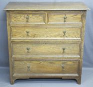 GOOD OAK CHEST of two short over three long drawers with drop handles, 108.5cms H, 107cms W, 50cms