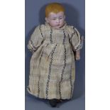 A SMALL BISQUE HEADED ANTIQUE DOLL, (A/F), 25cms L