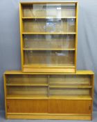 TWO VINTAGE TEAK SLIDING DOOR BOOKCASES, one being fully glass fronted, 112.5cms H, 91cms W, 24cms