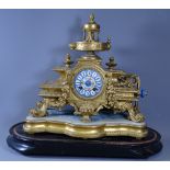 MANTEL CLOCK - French gilt metal on a base and wooden plinth for a dome, (glass not present),
