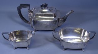 THREE PIECE SILVER TEA SERVICE - each piece of oblong plain form with concave corners and on