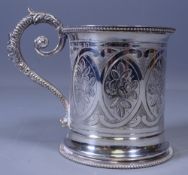 VICTORIAN SILVER TANKARD, attractively floral decorated with beadwork edging and scrolled handle