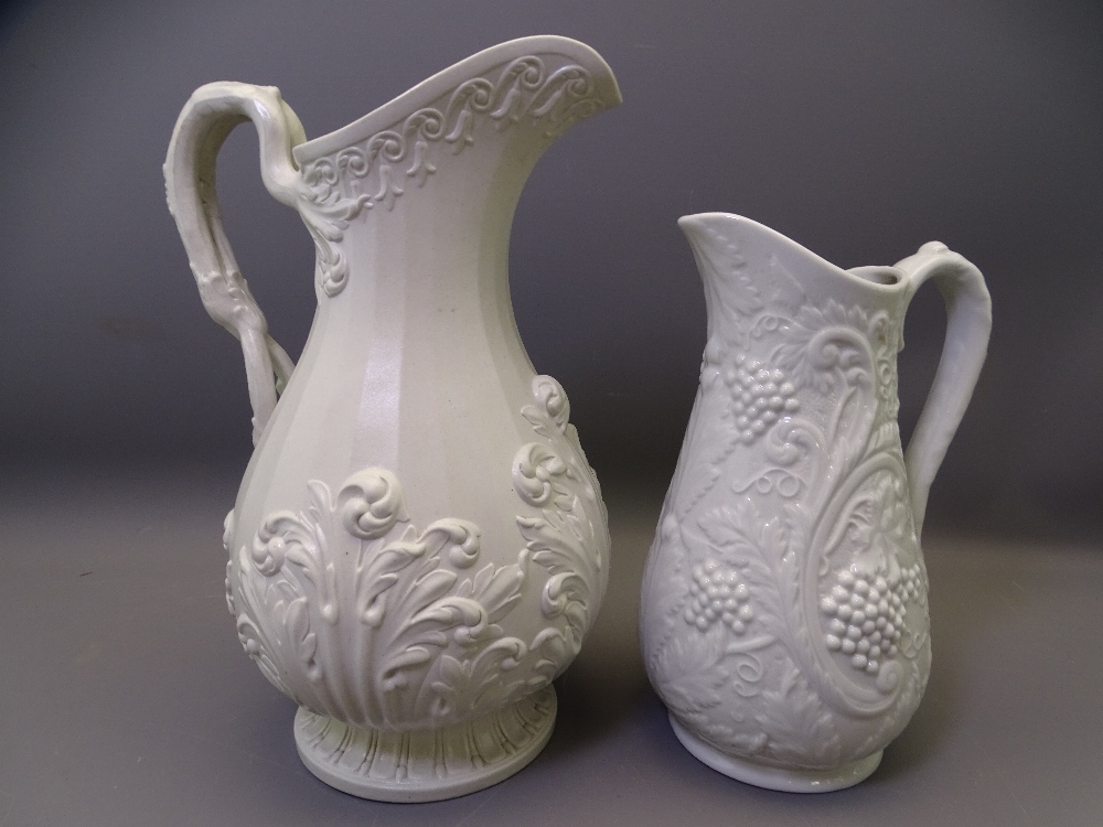 TWO JUGS - a handsome tall semi-glazed 19th century narrow necked Staffordshire jug with floral