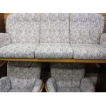 ERCOL LIGHT WOOD STICKBACK THREE PIECE LOUNGE SUITE of three-seater settee and two matching