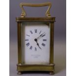 BRASS ENCASED CARRIAGE CLOCK, non-striking with dial bearing the name 'Mackay & Chisholm,