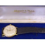 A GENT'S 9CT GOLD MAPPIN & WEBB QUARTZ WRISTWATCH with circular dial, leather strap and original box