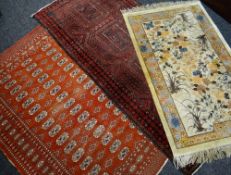 THREE ORIENTAL RUGS, comprising a Turkomen rug 184 x 126cms, Caucasian narrow rug 225 x 103cms,