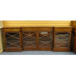 19TH CENTURY MAHOGANY LIBRARY LOW BOOKCASE, of inverted breakfront outline, with frieze drawers