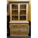 VICTORIAN PINE KITCHEN CABINET, angled cornice above glazed doors, on cupboard base, 121 x 42 x