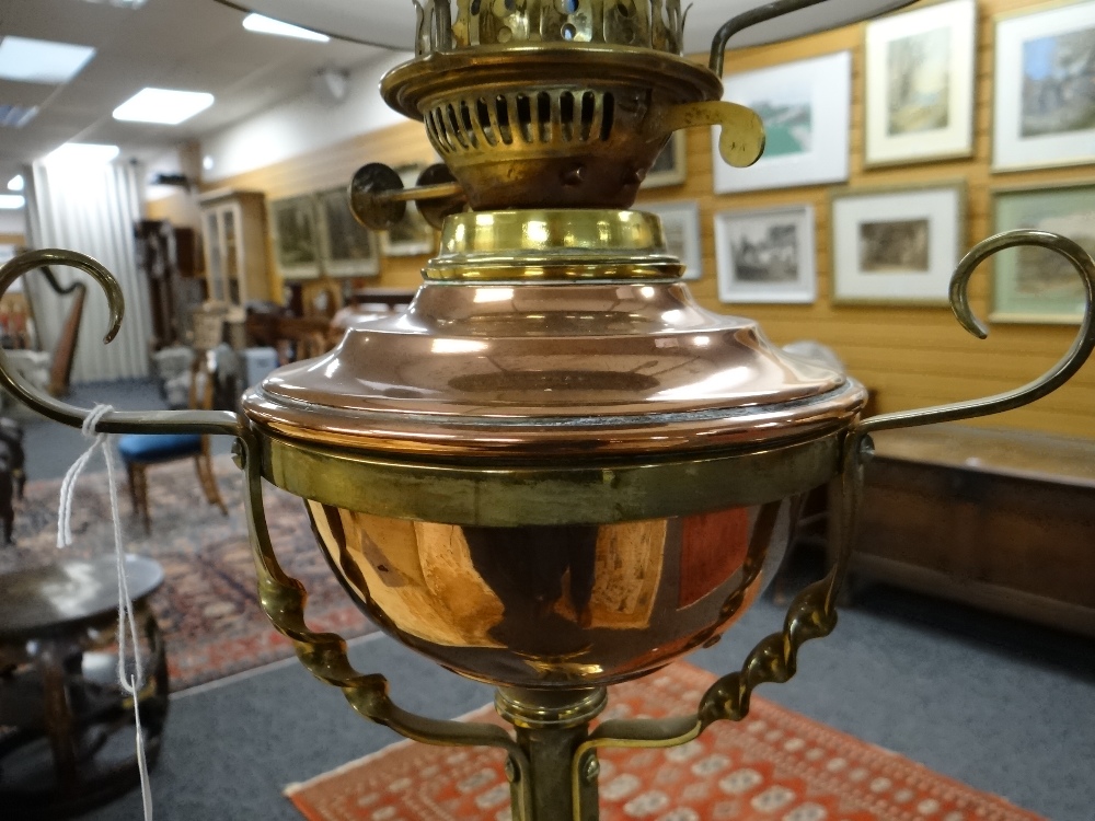 ARTS & CRAFTS BRASS AND COPPER STANDARD OIL LAMP, with foliate decorated tripod base and column, - Image 11 of 20