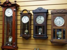 FOUR VARIOUS 20TH CENTURY WALL CLOCKS including a German Vienna-style wall clock with grid iron