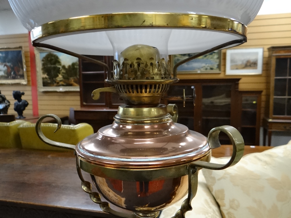 ARTS & CRAFTS BRASS AND COPPER STANDARD OIL LAMP, with foliate decorated tripod base and column, - Image 10 of 20