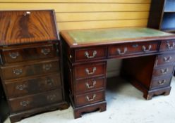 VICTORIAN-STYLE MAHOGANY PEDESTAL DESK, tooled green leather inset top above an arrangement of