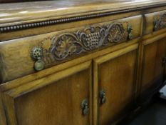 1930s JACOBEAN-STYLE CARVED OAK SIDEBOARD, stage back, frieze drawers and cupboards, trestle base,