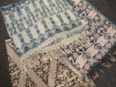 THREE TIMOR WARP IKAT CLOTHS, Lesser Sunda Islands, Indonesia, including two in indigo-dyed cotton