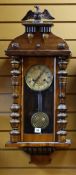 GERMAN VIENNA-STYLE WALNUT WALL CLOCK, with art nouveau gilt metal dail, turned half pilaster cases