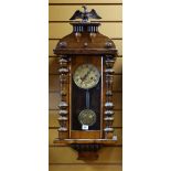 GERMAN VIENNA-STYLE WALNUT WALL CLOCK, with art nouveau gilt metal dail, turned half pilaster cases