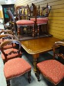 VICTORIAN WALNUT EXTENDING DINING TABLE & SET OF EIGHT CHAIRS, the table with moulded top on leaf